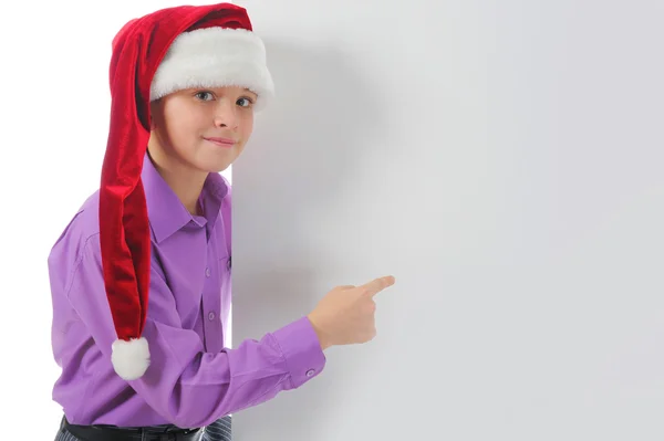 サンタ クロースの帽子で快活な少年 — ストック写真