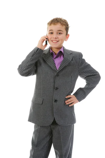 Chłopiec rozmawiający przez telefon. — Zdjęcie stockowe