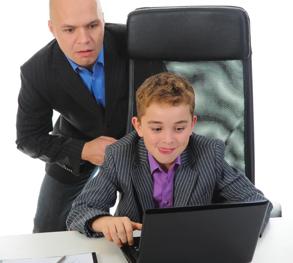 Young businessman using a laptop — Stock Photo, Image