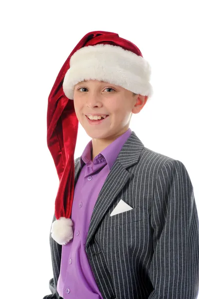 Niño alegre en sombrero de Santa Claus —  Fotos de Stock