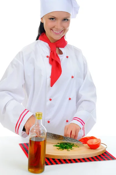 Chef corta o tomate — Fotografia de Stock