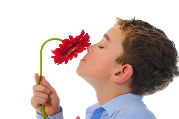 Chlapec s květinou — Stock fotografie