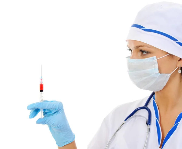 Verpleegster met een injectiespuit in zijn hand. — Stockfoto