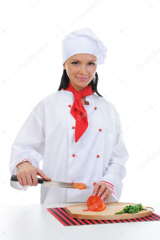Chef cuts the tomato
