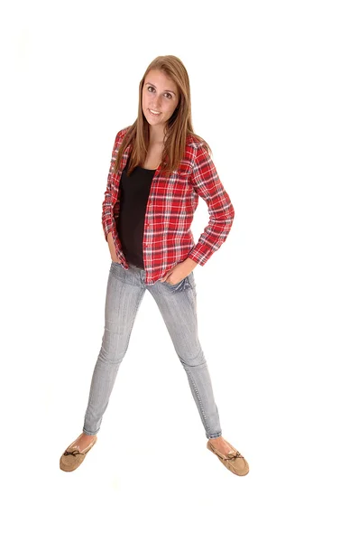 Dívka v džínách, stojící. — Stock fotografie