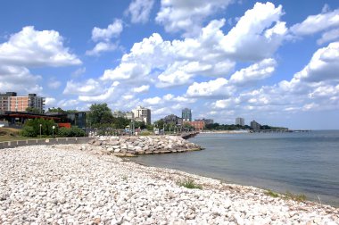 Town on shore of lake Ontario. clipart