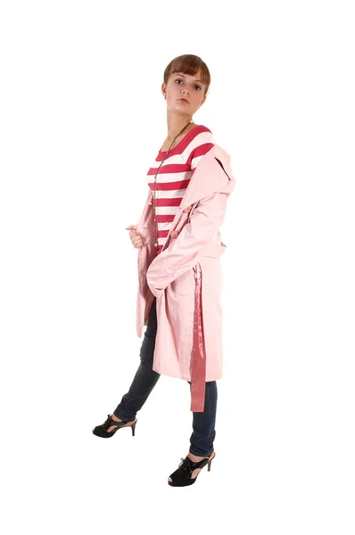 Flicka i rosa kappa. — Stockfoto