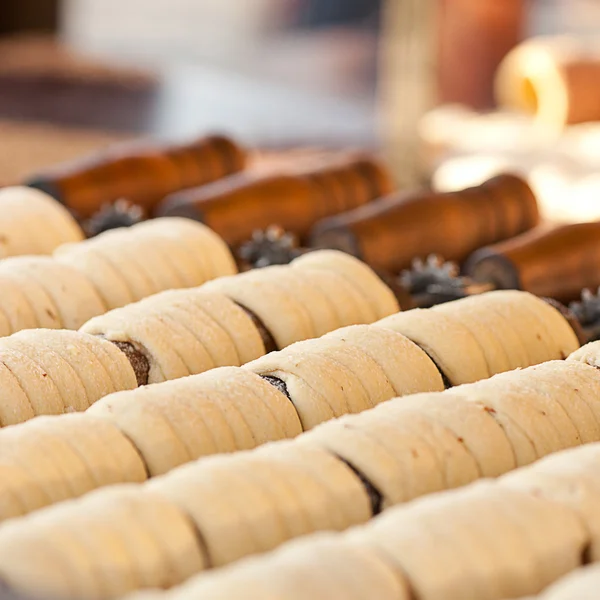 Biscuits in sugar roasting on a spit — Stock Photo, Image