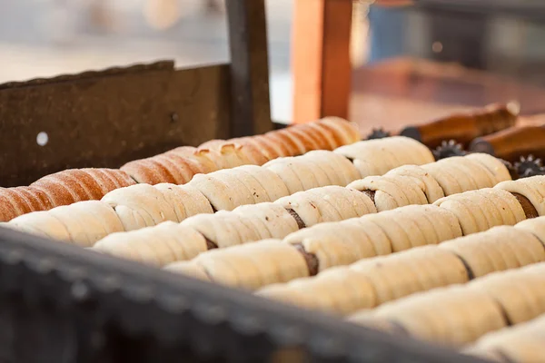 Biscuits in sugar roasting on a spit — Stock Photo, Image