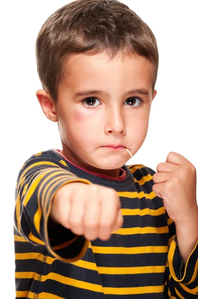 Little bully with toothpick and black eye attack — Stockfoto