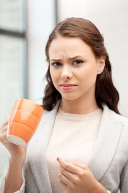 Lovely businesswoman with mug clipart