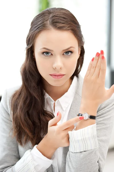 Businesswoman with watch — Stock Photo, Image