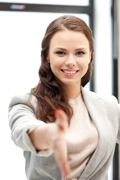 Woman with an open hand ready for handshake Royalty Free Stock Images