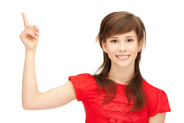 Девочка-подросток с поднятым пальцем — стоковое фото