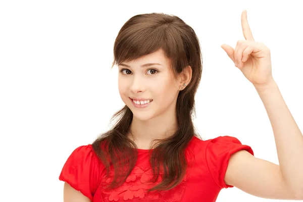 Teenager-Mädchen mit erhobenem Finger — Stockfoto