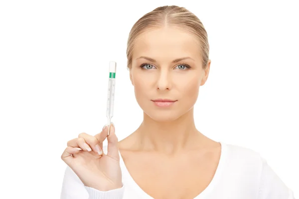 Attractive female doctor with thermometer — Stock Photo, Image
