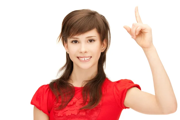 Tienermeisje met haar vinger omhoog — Stockfoto