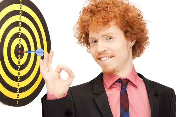 Businessman with dart and target — Stock Photo, Image