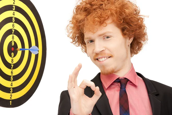 Businessman with dart and target — Stock Photo, Image