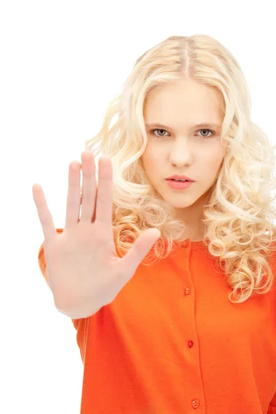 Woman making stop gesture Stock Photo