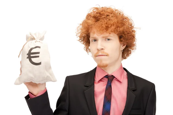 Человек с подписанной евро сумкой — стоковое фото