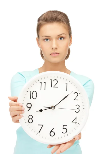 Kobieta gospodarstwa duży zegar — Zdjęcie stockowe