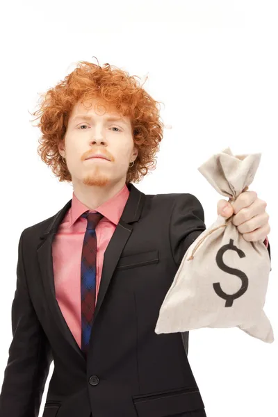 Man with dollar signed bag — Stock Photo, Image