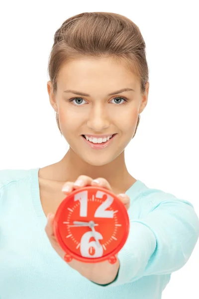 Woman holding alarm clock — Stock Photo, Image