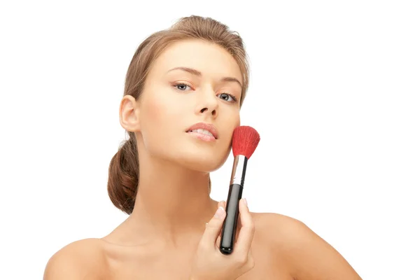 Beautiful woman with brush Stock Picture