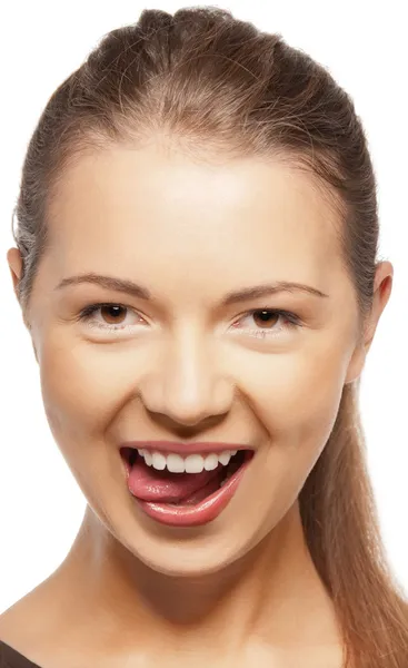 Adolescente menina saindo de sua língua — Fotografia de Stock