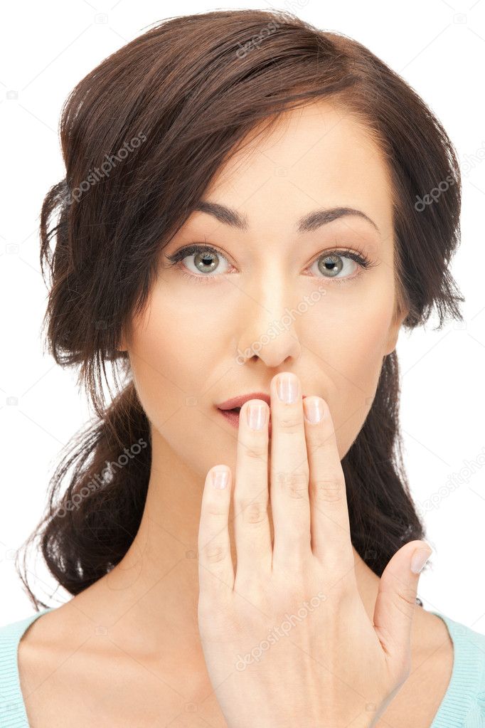 Woman with hand over mouth — Stock Photo © Syda_Productions 7688896