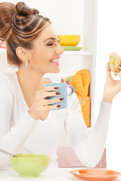 Lovely housewife with sandwich — Stock Photo, Image