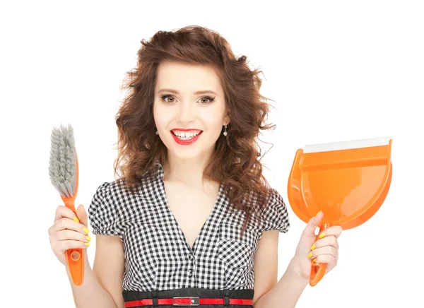 Mooie vrouw met het schoonmaken van sweep — Stockfoto