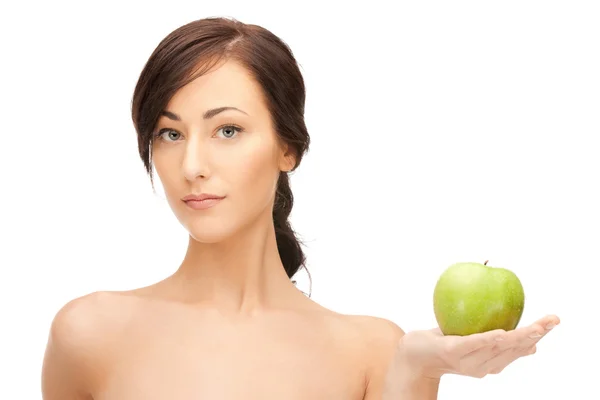 Young beautiful woman with green apple Royalty Free Stock Images