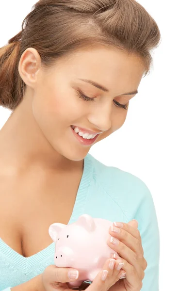 Mooie vrouw met piggy bank — Stockfoto