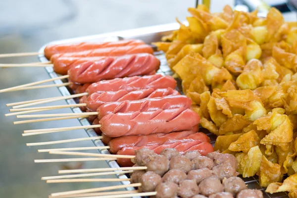 Fried sausage with bamboo stick — Stock Photo, Image