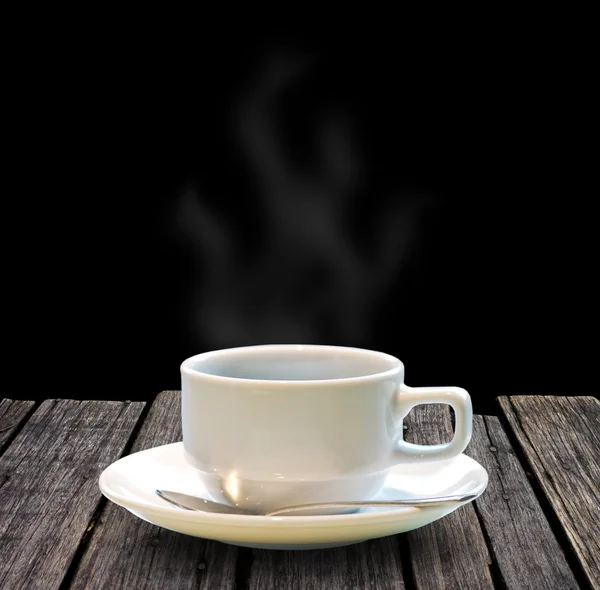 Café quente na mesa de madeira — Fotografia de Stock