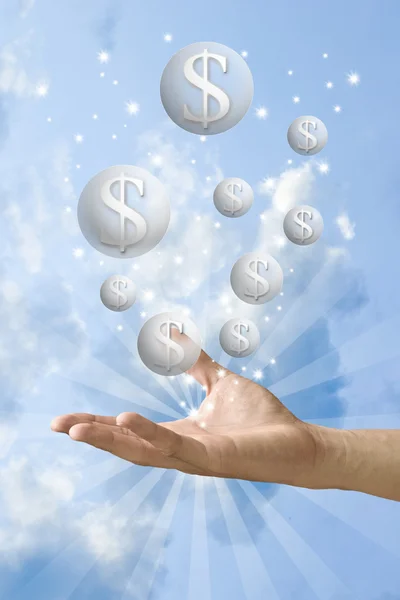 Geld zeepbel vliegen uit de hand met mooie hemelachtergrond — Stockfoto