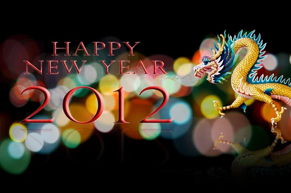 Gott nytt år 2012 med dragon staty — Stockfoto