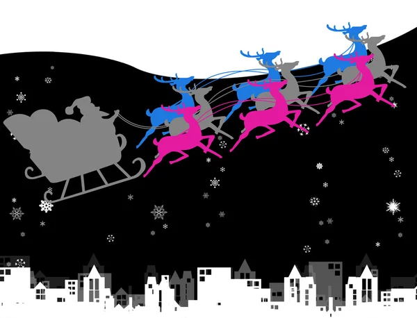 Santa met zijn slee en herten lopen in de lucht — Stockfoto