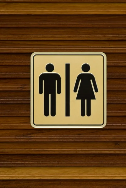 Toilet sign on wooden door — Stock Photo, Image
