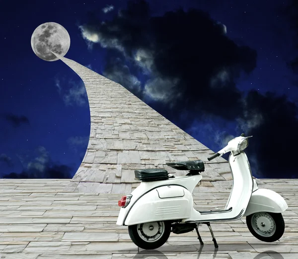 Retro scooter parking with road to the moon — Stock Photo, Image