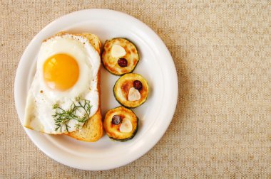 Roasted egg and zucchin clipart