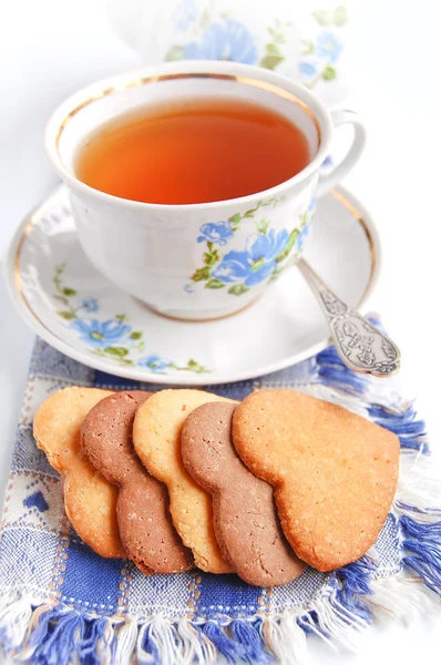 Xícara de chá e biscoitos caseiros — Fotografia de Stock