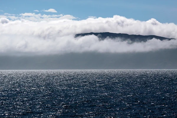 Pobřeží moře s mraky — Stock fotografie