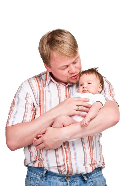 Очаровательный ребенок на руках отца — стоковое фото