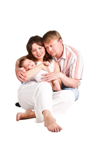 Billede af glade forældre, der holder deres barn - Stock-foto