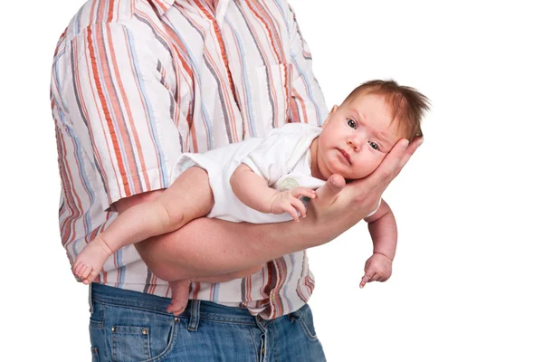Mooie baby liggend op een vader's hand Rechtenvrije Stockafbeeldingen