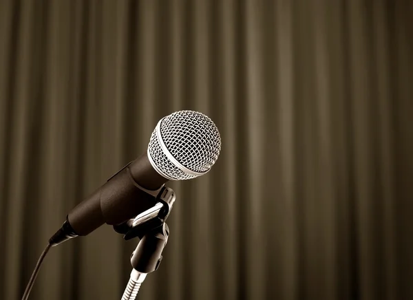 Microphone behind curtain — Stock Photo, Image