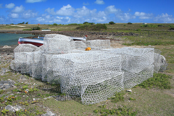 Fish traps stacked in the open; Rodrigues Island